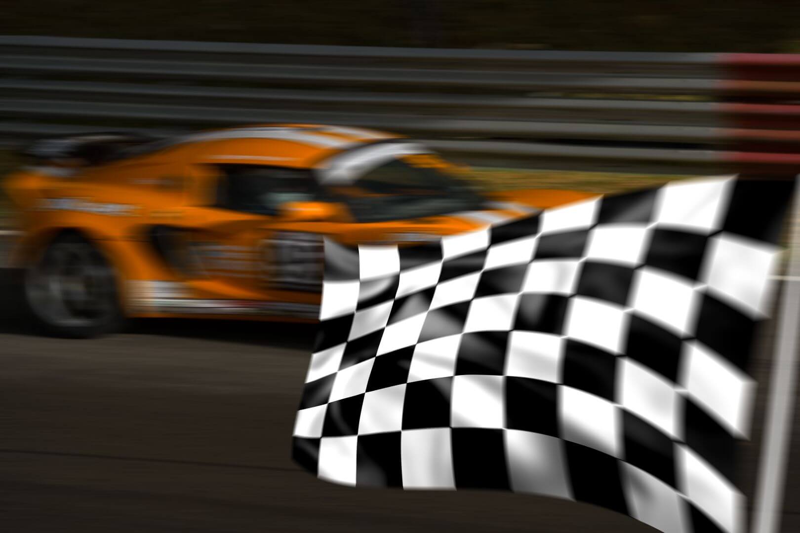 bigstock-Orange-Racing-Car-And-Chequere-2484520.jpg